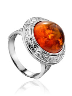 Нарядное серебряное кольцо с круглой вставкой коньячного янтаря «Ампир» Amb