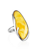 Удлиненное кольцо из цельного медового янтаря с серебром «Маньяна» Amberhol